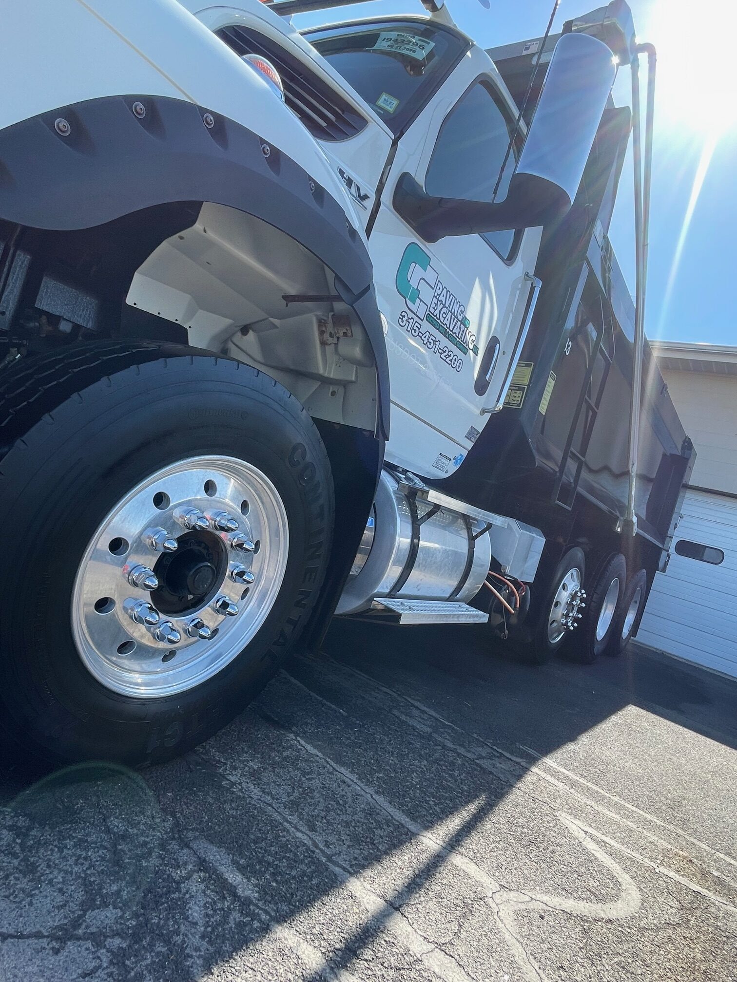 Under Driver Side Wheel 